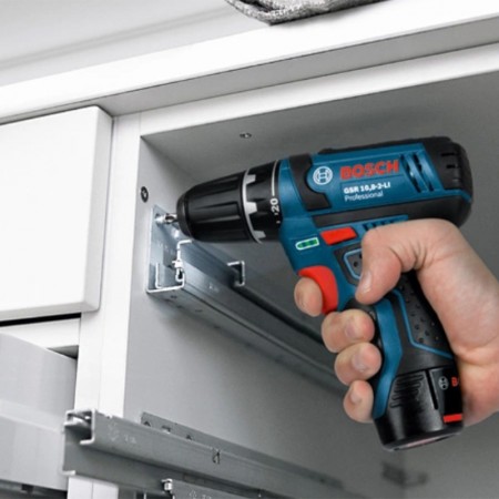 Perceuse-visseuse à percussion GSB 12 V-15 + 2 batteries 12V 6 Ah + chargeur GAL 12V-40 BOSCH